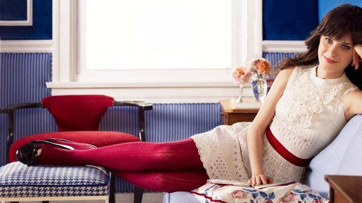 Zooey Deschanel Sitting Pose In White Dress Photoshoot
